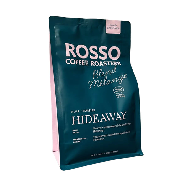 Rosso Coffee Roasters Hideaway Blend coffee package on a textured surface