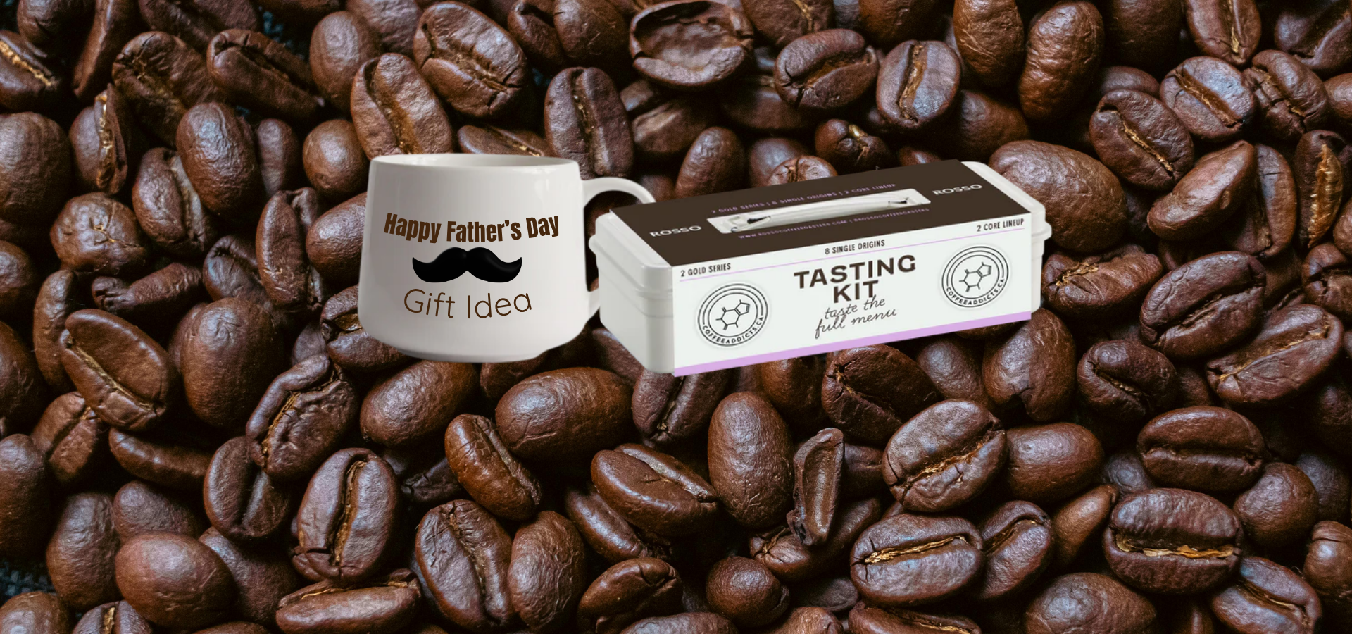Ceramic mug with 'Happy Father's Day Gift Idea' text and a box labeled 'Tasting Kit' on coffee beans.