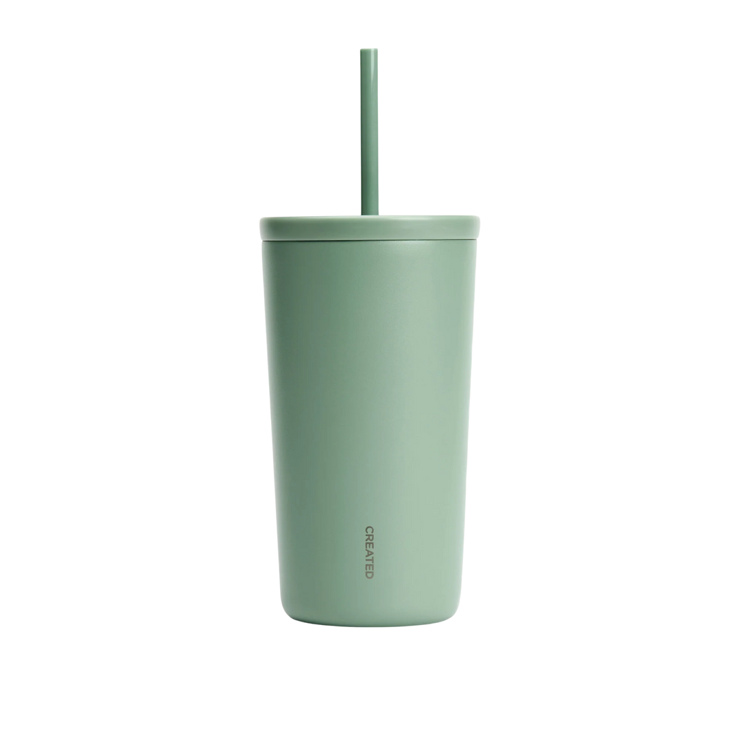Sage Green tumbler with a straw on a white background
